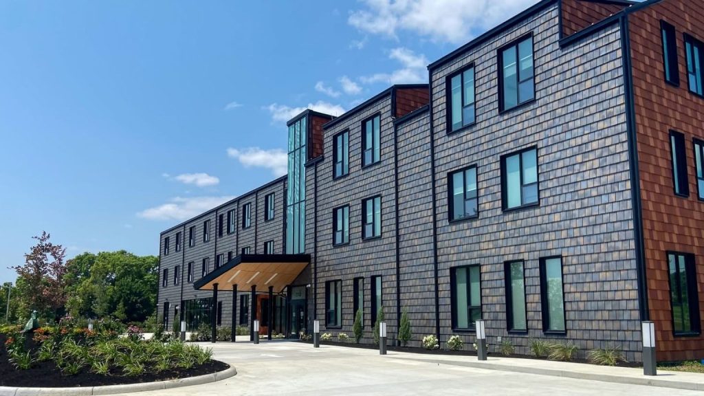 The newly expanded Ronald McDonald House Dayton building on Valley Street, a modern multi-story facility across from Dayton Children's Hospital.]
