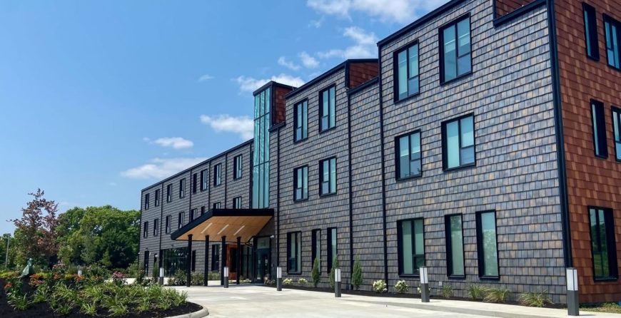 The newly expanded Ronald McDonald House Dayton building on Valley Street, a modern multi-story facility across from Dayton Children's Hospital.]