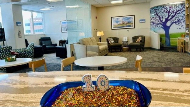 Ronald McDonald Family Room inside Dayton Children’s Hospital, featuring seating, tables, and a calm space for parents to rest.